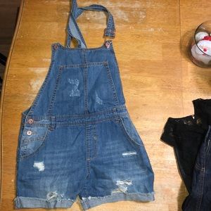 Dark blue ripped overalls